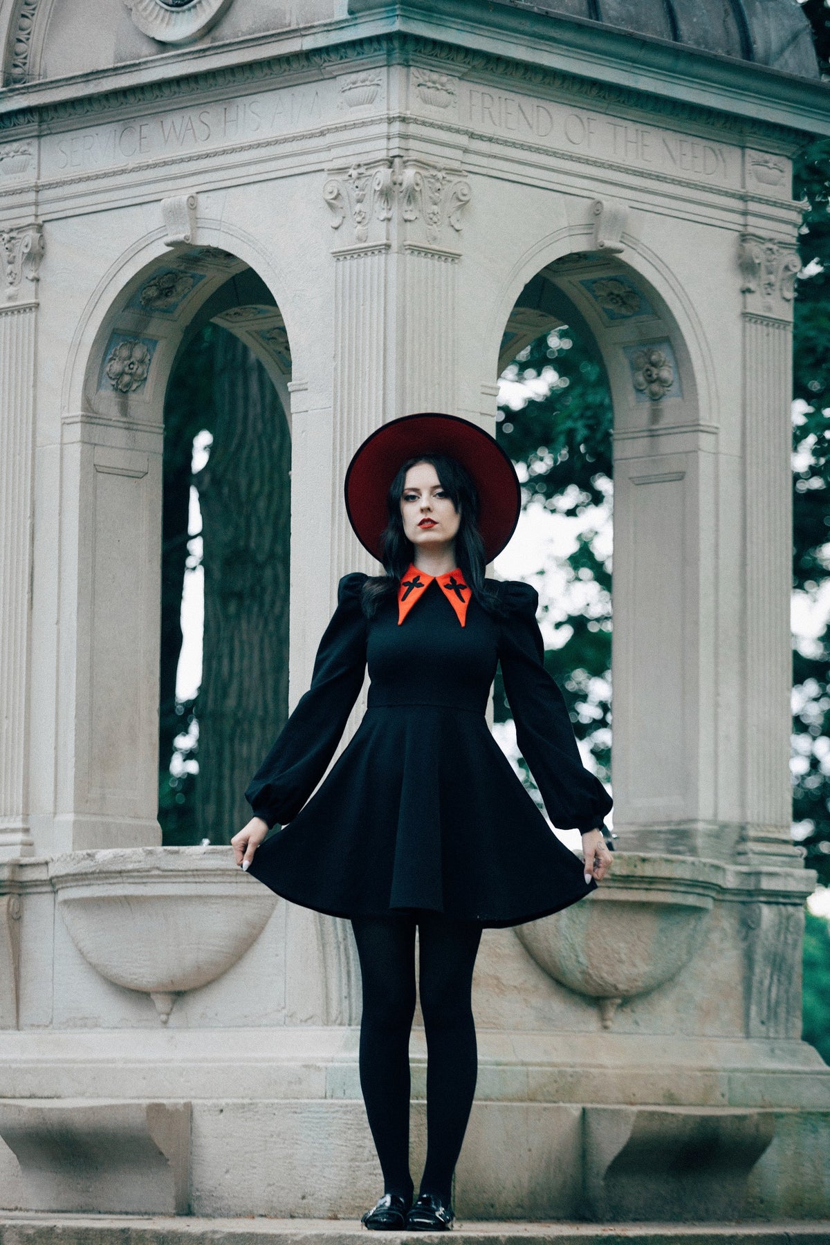 Bring timeless charm to special occasions with this moonlit-inspired black Baptism Dress. Its oversized pointed collar features delicate cross embroidery, and you can choose between a traditional black collar or a lively red one. The puffed shoulders and flowing bishop sleeves give the dress elegance and movement, while the soft, stretchy ponte fabric keeps you warm, cozy, and comfortable all day long.