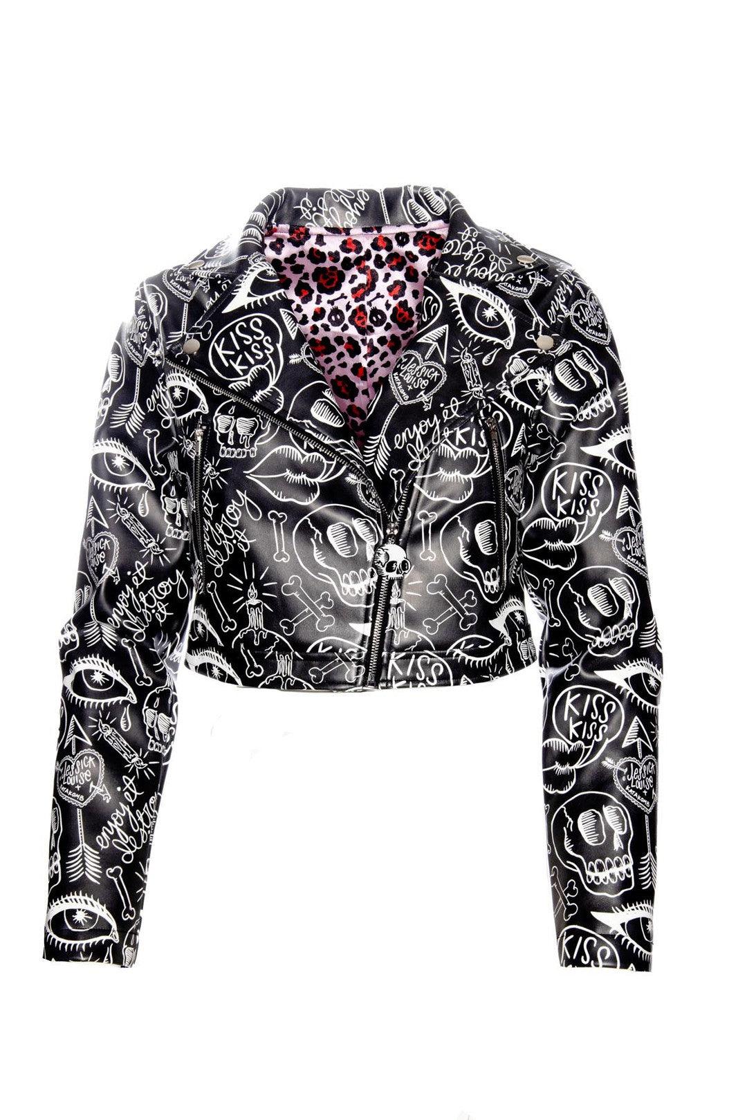 Fashionable biker-style women's moto jacket adorned with Jessica Louise graffiti art, designed with a cropped cut, leopard print inner lining, functional side pockets, and a bold exposed metal zipper with unique skull logo pull for standout streetwear looks.