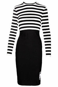 Edgy Jailhouse Dress in red or black, combining a high-neck striped long-sleeve bodice with a fitted bengaline skirt and detailed skull embroidery — a perfect fusion of gothic, retro, and punk aesthetics that captures attention and celebrates individuality.