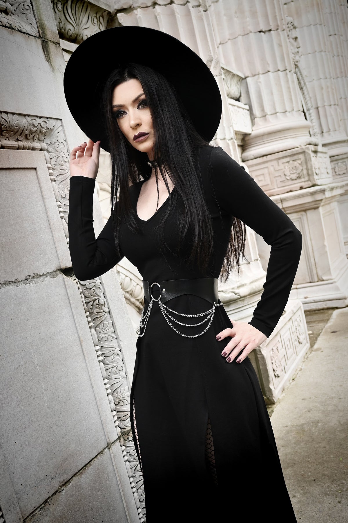 A full-length Kassandra Maxi Dress crafted from premium poly blend material that provides exceptional stretch and comfort. Featuring a low-cut neckline that flatters the bust and high side slits for effortless movement, this versatile dress is perfect for both relaxed home settings and chic nights out.