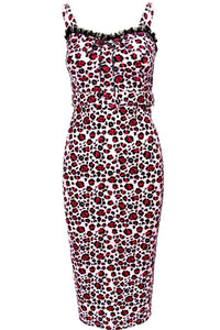 The Love Bites Pencil Dress in leopard print embodies wild sophistication with its figure-hugging silhouette, enhanced cup design, and ruched back that flatters every curve. Crafted from comfortable, stretchy fabric, it features a sweetheart neckline, playful ruffles, and a cute ribbon bow that adds a touch of vintage glamour to this fierce, high-fashion look for women who want to turn heads.