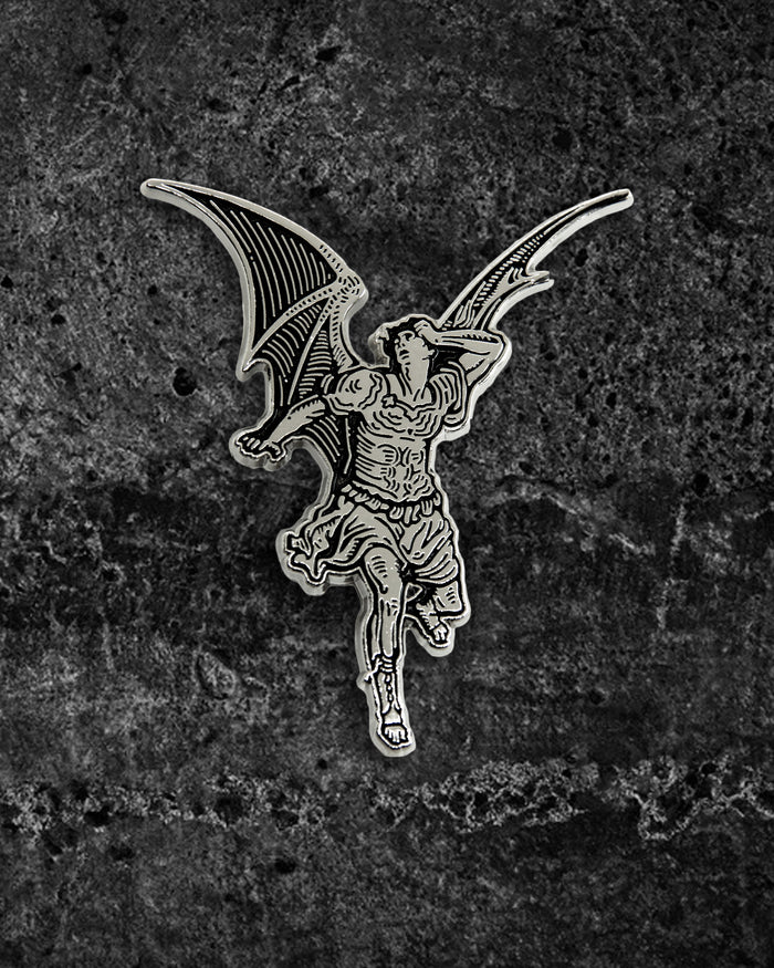 Large silver and black enamel gothic pin by Ectogasm inspired by Gustave Doré’s illustration for Milton’s "Paradise Lost," featuring a winged Lucifer fallen from grace. Measures 2.2 x 1.8 inches with dual metal clasps for secure wear, perfect for jackets, backpacks, or layering with other alternative pins in a collector’s set.