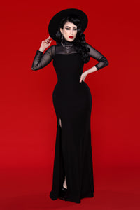 A sophisticated black maxi dress made from premium thick stretch material that hugs the body for a flawless silhouette. The Onyx Dress includes thin adjustable spaghetti straps, a bold thigh-high side slit for added allure, and a smooth slip-on design without zippers, making it an ideal choice for elegant night-out looks, cocktail parties, or sleek minimalist evening wear.