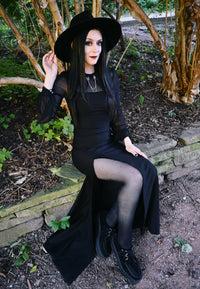 Designed for the modern woman, the Onyx black maxi dress combines comfort, versatility, and sensuality. Its thick yet flexible fabric sculpts the body without restriction, and the pull-on silhouette ensures an easy, seamless fit. Adjustable straps allow for personalization, while the thigh-high slit adds a captivating touch — making this piece perfect for contemporary evening fashion or elevated casual styling.