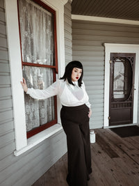 Edgy Personal Jesus top in semi-transparent soft mesh fabric with long sleeves, oversized embroidered cross designs on an extended pointy collar, and a subtle back keyhole cut-out, available in bold black, pristine white, or vibrant purple, perfect for gothic fashion, alternative clothing, and nightlife ensembles.