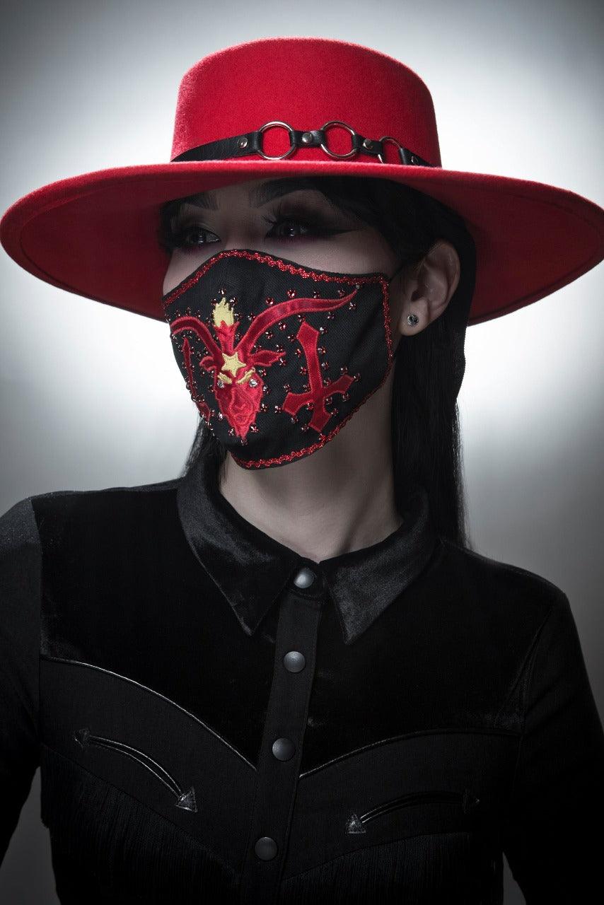 Edgy bondage-style hat belt made from 100% vegan leather with three metal O-rings, easily slipped on or off Katakomb wool hats. A one-size-fits-all accessory that elevates gothic, punk, and alternative fashion outfits with a bold, versatile statement.