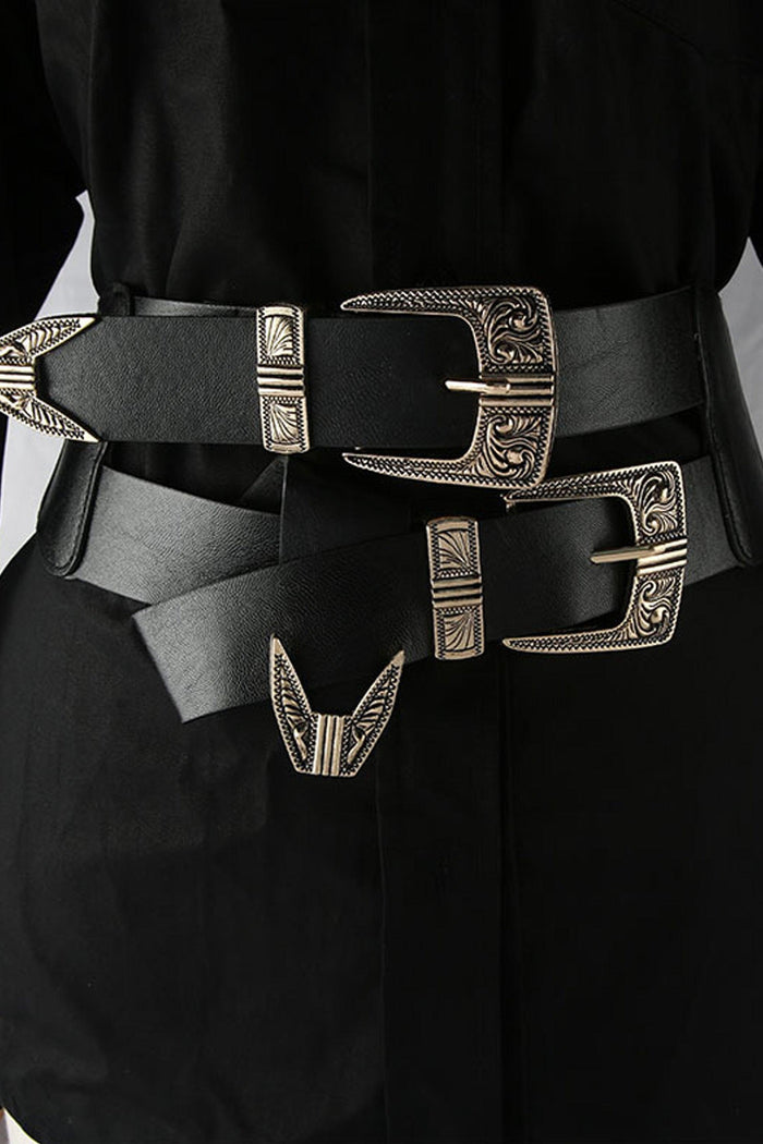 Turn up the edge with the Double Buckle Belt from KATAKOMB—a sleek black stretch design with dual antique‑silver western‑inspired buckles. One size fits most, making it the perfect statement accessory to cinch dresses, high waists or trousers for bold, alternative style.