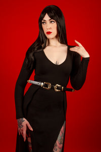 The Kassandra Maxi Dress radiates modern femininity, featuring a smooth, stretchy poly blend fabric that molds perfectly to your shape. With a deep neckline and dual thigh-high slits, it combines comfort, elegance, and allure for a look that transitions effortlessly through the seasons.