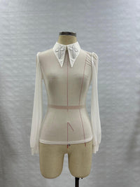 Gothic-inspired Personal Jesus top featuring long sleeves, semi-transparent soft mesh material, oversized embroidered crosses on an extended pointy collar, subtle back keyhole detail, and stretchy fabric for movement, perfect for edgy streetwear, festival styling, and club-ready fashion.