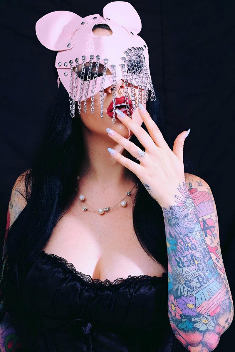 Chained Animal Mask in pink vegan leather with metallic chain accents and animal-inspired design, a bold fashion accessory for edgy streetwear and costume styling from Katakomb.