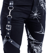 Punk inspired black jeans with elasticized stretch fabric, reinforced with a spider web print texture, equipped with a detachable waist‑harness and dual back pockets, composition: 58% cotton, 39% polyester, 3% elastane for comfort and durability.