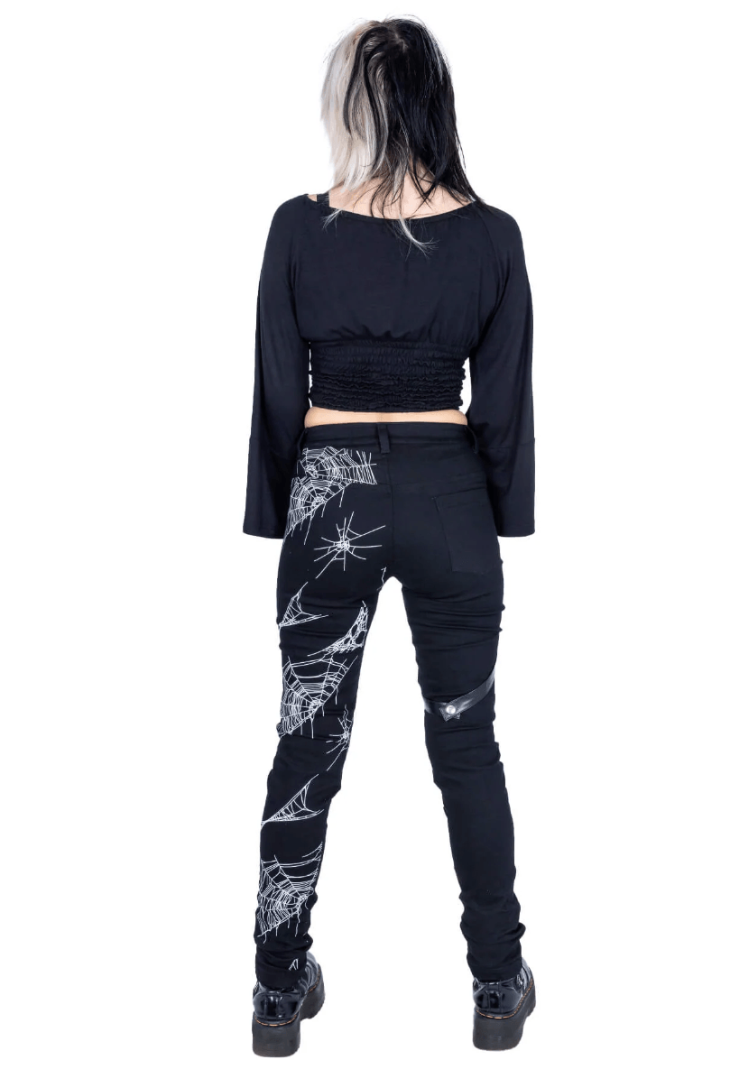 Rock bold in these black death rocker jeans: stretch jean material printed with spider webs, a detachable harness adds attitude, back pockets for practicality, all in a 58% cotton / 39% polyester / 3% elastane blend that holds shape and movement.