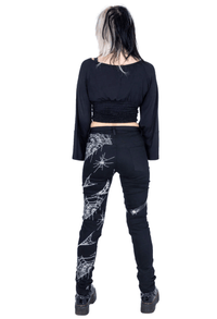 Rock bold in these black death rocker jeans: stretch jean material printed with spider webs, a detachable harness adds attitude, back pockets for practicality, all in a 58% cotton / 39% polyester / 3% elastane blend that holds shape and movement.