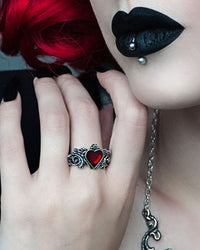 Alchemy miniature pewter ring featuring a red enamel heart set in intricate floret detailing. Elegant gothic accessory symbolizing love and passion, handmade in England.