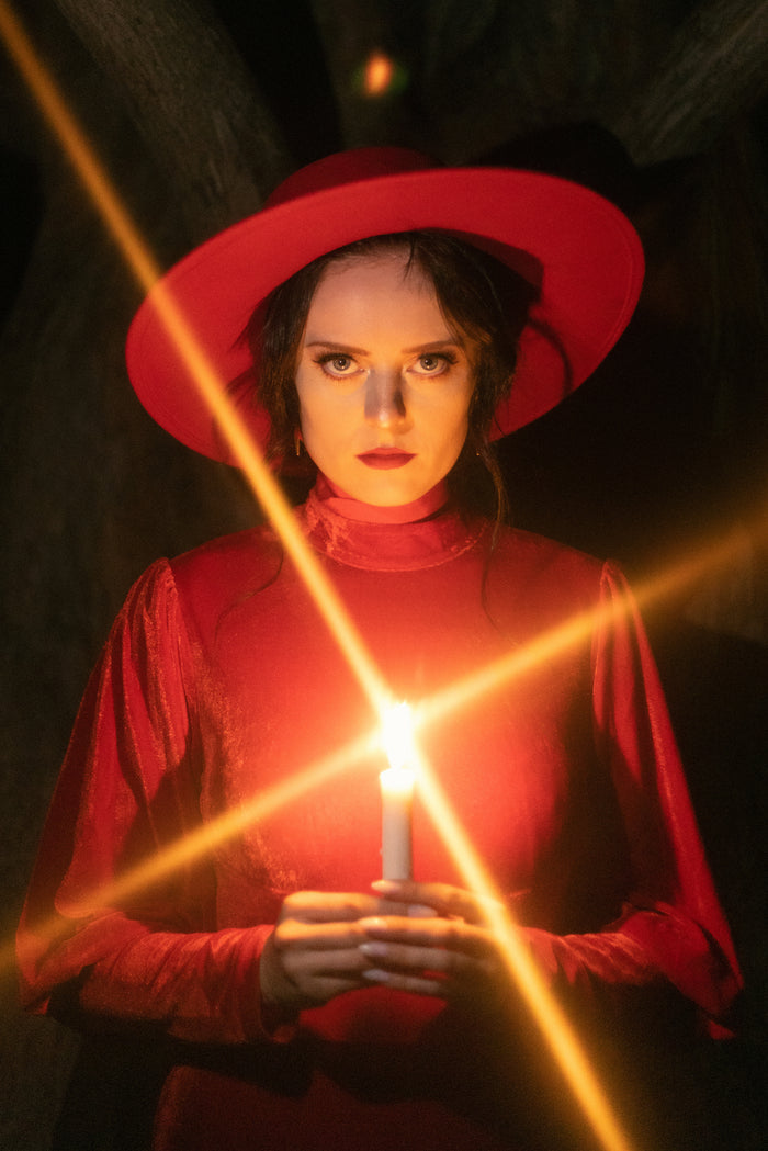 A luxurious wide-brimmed wool hat made from premium-quality materials, the American Gothic hat combines timeless elegance with bold, modern design. Featuring a sleek black ribbon detail that enhances its romantic aesthetic, this statement accessory offers both sophistication and practicality. Perfect for fashion-forward individuals seeking a dramatic finishing touch to any outfit, this hat is available in striking black and vibrant red.