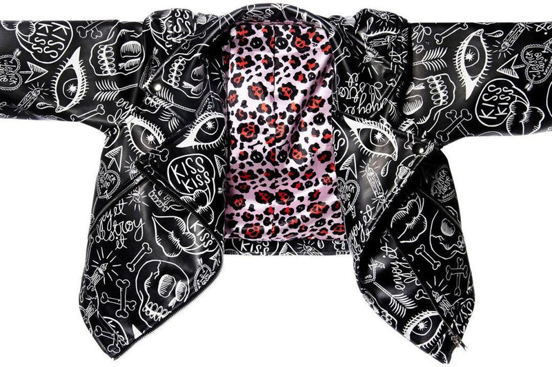 Cropped Graffiti Moto Jacket by Jessica Louise with eye-catching artwork, featuring custom leopard print lining, functional pockets, and a striking exposed metal zipper with skull logo pull, combining artistic streetwear design with practical biker-inspired details.