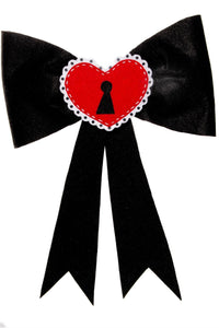 Jessica Louise oversized heart locket bow, 11 x 12 inches, versatile clip for hair or clothing. Perfect statement accessory for alternative, gothic, or cute fashion ensembles.