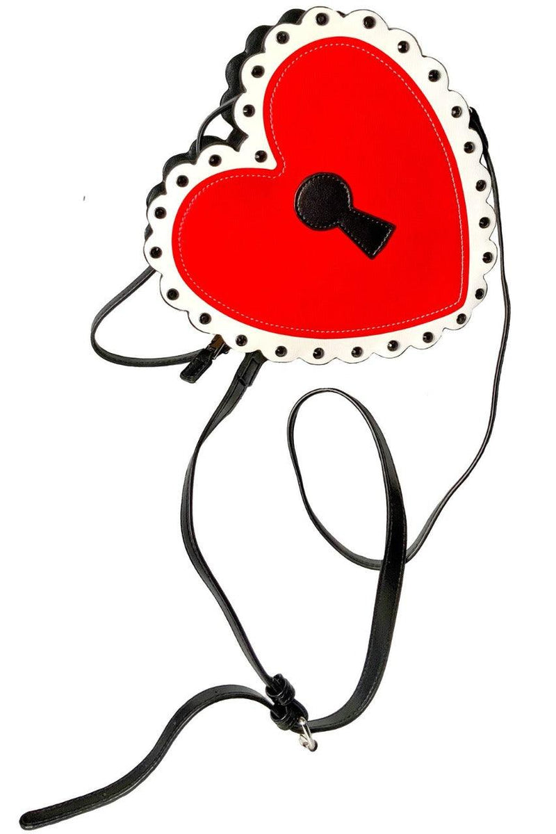 Chic Heart Locket Purse with versatile styling options including a cross-body strap for hands-free convenience and a stylish handle for elegant carrying, combining vintage-inspired design with modern functionality for fashion-forward looks.