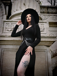 Elegant and versatile, the Kassandra Maxi Dress showcases a figure-embracing fit in a smooth, stretchy poly blend fabric. Designed with two daring thigh-high slits and a flattering deep neckline, it seamlessly transitions from laid-back afternoons to elevated evening events.