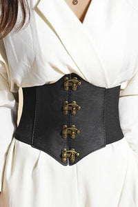 Stylish one-size Locked Up Belt by KATAKOMB, with a flexible spandex fit and distinctive brass accents, perfect for adding a statement edge to dresses, blouses, skirts, and high-fashion ensembles.