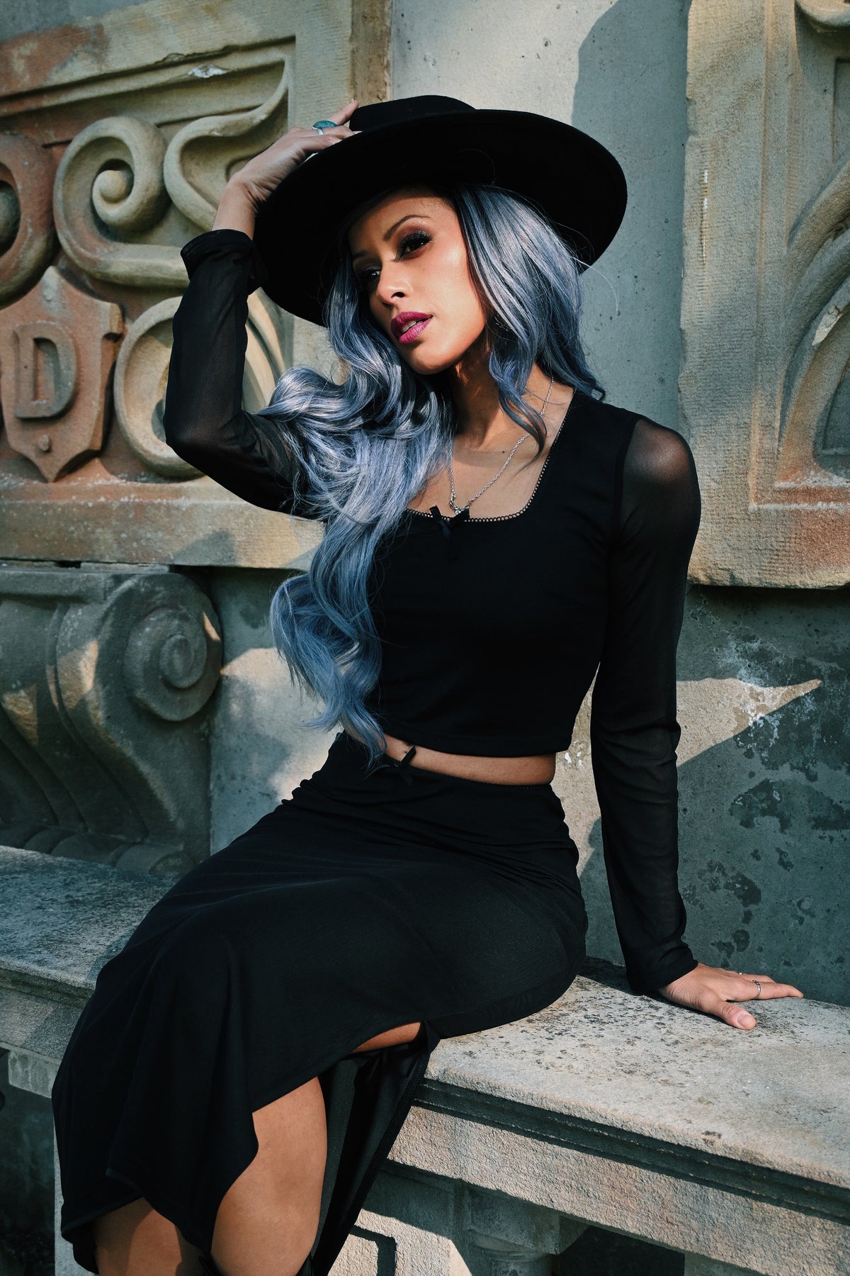 Modern and trendy women’s mesh two-piece set consisting of a fitted square-neck crop top with sheer long sleeves and a high-waisted pencil skirt with a side slit, crafted from soft and flexible polyester mesh, featuring subtle bow embellishments for a feminine touch, ideal for evening parties, clubwear, or stylish casual events.