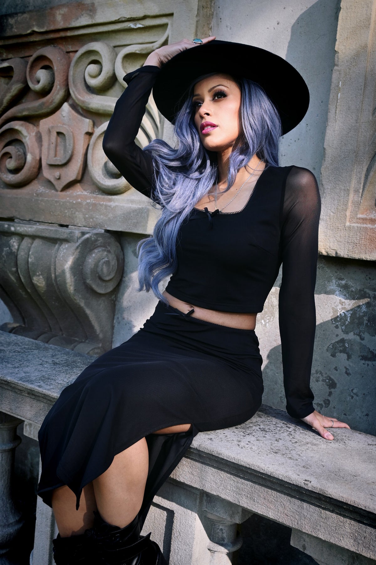 Sexy and body-hugging mesh two-piece outfit with a long-sleeve sheer crop top featuring a square neckline, paired with a high-waisted pencil skirt with a side slit, made from soft and stretchy polyester mesh for ultimate comfort, decorated with delicate bow accents, perfect for special occasions, date nights, or elegant nightlife fashion.