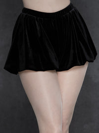 High-waisted black velvet bloomers with a full gathered silhouette, soft stretch waistband, and plush fabric with a subtle light-catching sheen.