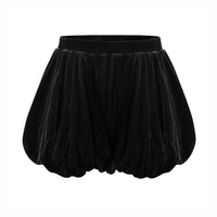 Black velvet high-waisted bloomers with a loose, gathered fit for volume through the hips, featuring a comfortable stretch waistband and smooth light-reflecting finish.