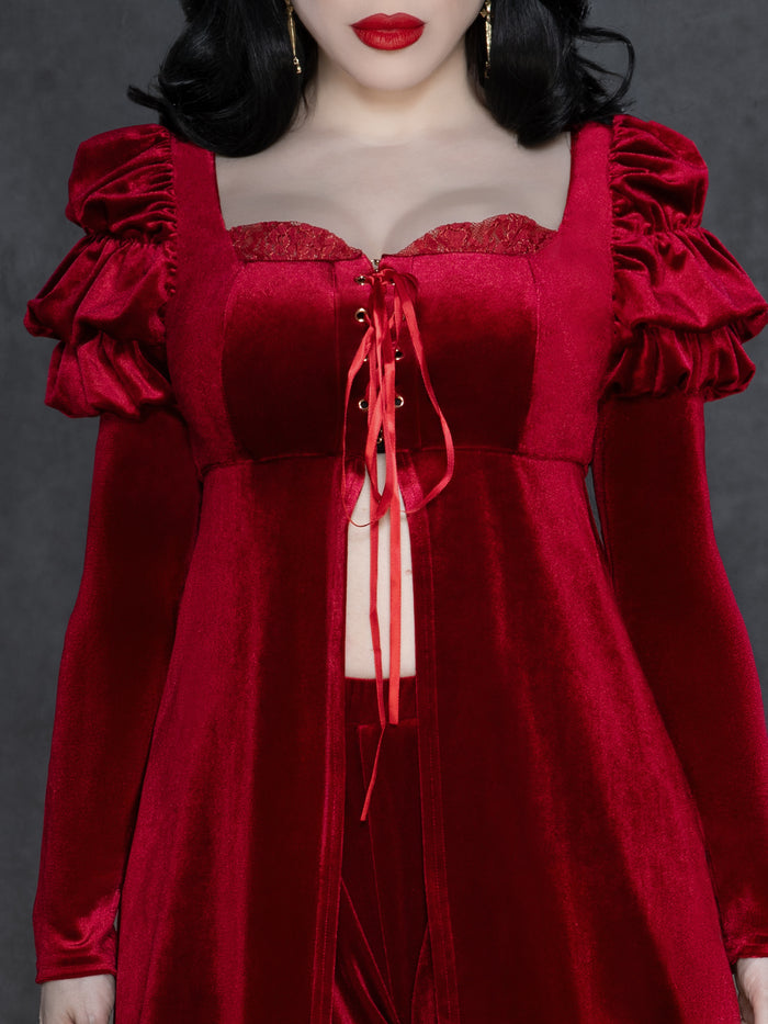 Romantic gothic velvet two-piece set featuring a long sleeve babydoll top with puffed shoulders and lace-up corset detail, paired with high-waisted bloomers in plush shimmering velvet.