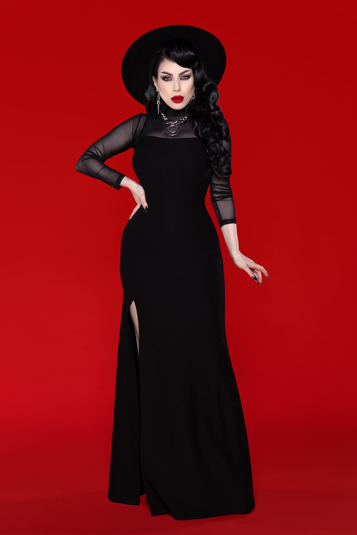 This stunning Onyx black maxi dress combines timeless style with modern comfort, featuring a body-skimming fit in dense, ultra-stretch fabric that effortlessly moves with you. Its adjustable spaghetti straps and high side slit create a flattering and feminine look, perfect for formal occasions, luxury resort wear, or statement evening outfits.