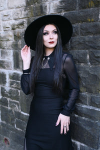 The Onyx Dress in classic black embodies the perfect blend of minimalism and allure. Its premium thick, stretchy fabric creates a smooth, body-hugging fit without the need for a zipper, and the adjustable spaghetti straps offer adaptability. Completed with a daring high side slit, this black maxi dress is an elegant, versatile choice for formal occasions, nights out, or elevated everyday wear.