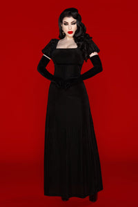 A luxurious Regency-style velvet burnout dress with an enchanting empire waistline that highlights the figure in elegant Victorian-inspired fashion. Featuring romantic puff sleeves and a soft, stretchy fabric that offers comfort and grace, this gothic yet feminine dress exudes timeless sophistication. The deep scoop neckline draws attention to the collarbone while the intricate burnout velvet pattern adds texture and allure, making it perfect for evening wear or alternative fashion lovers.