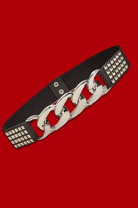 Edgy studded chained belt with wide elastic waistband, featuring silver-tone curb chain and pyramid studs, perfect for cinching blazers, dresses, or high-waist pants for a bold fashion statement.