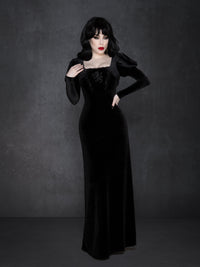 Romantic gothic black velvet dress with dramatic puff sleeves, lace-trimmed square neckline, and intricate wolf and vine embroidery, designed with a fitted waist and elegant full-length silhouette.