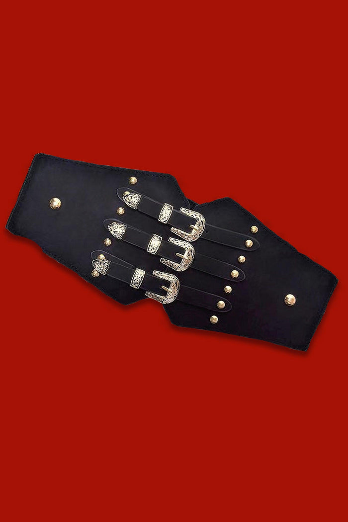 Triple Buckle Belt in black vegan leather featuring three parallel silver buckles and a stretchy back panel for a comfortable fit. Perfect for gothic, alternative, or edgy street-style outfits, ideal for cinching dresses, coats, or oversized shirts.