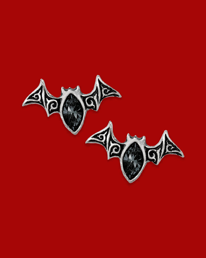 Stylized bat pewter earrings with dark cut crystal details and surgical steel posts. Elegant gothic statement studs, perfect for night-inspired or alternative fashion looks.
