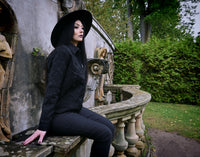 Tonal-black 1950s-inspired work jacket with intricate black web embroidery at key points (front, back, sleeves), two zippered pockets along the side seams and a hidden interior pocket for extra storage, an ideal layering piece for mild-weather seasons.