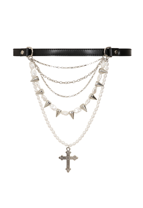 The Divine Edge Belt features a sleek black leather base decorated with rows of delicate pearls, edgy metal spikes, and layered chains. A bold cross pendant adds a distinctive gothic focal point to the center of the belt. Designed to blend softness with punk attitude, this statement accessory brings texture, contrast, and dramatic character to alternative, gothic, and edgy outfits.
