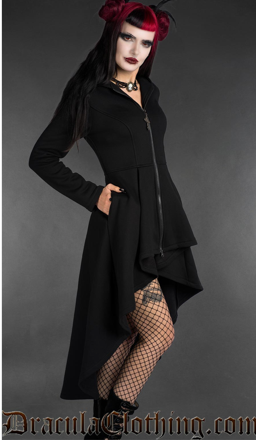A black high-low cut hoodie with a long, flowing silhouette designed for dramatic layering. The garment is crafted from heavyweight 400 GSM cotton with a soft fleece lining for extra warmth and comfort. An oversized hood, deep pockets, and black front zipper provide practical details, while corset-style lacing across the back and a gothic cross zipper pull create a dark romantic aesthetic.