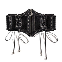 A striking black corset-style waist belt with a dark celestial aesthetic, featuring synthetic leather construction, mesh panels, and silver stud accents. The center front is finished with a functional zipper and crescent moon charm, while decorative side lacing with silver skull aglets adds a macabre gothic touch. A wide ruffled elastic band at the back provides a flexible fit and comfortable waist cinching.
