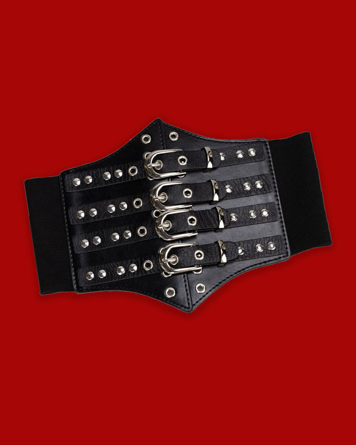 A wide black corset-style waist belt featuring a pointed faux-leather front decorated with silver studs and eyelets. Four adjustable buckles create a bold, structured look, while the stacked silver hardware adds an industrial edge. A thick black elastic band at the back provides a close and comfortable fit, finished with secure metal snap closures. Perfect for adding dramatic gothic and alternative style to any outfit.
