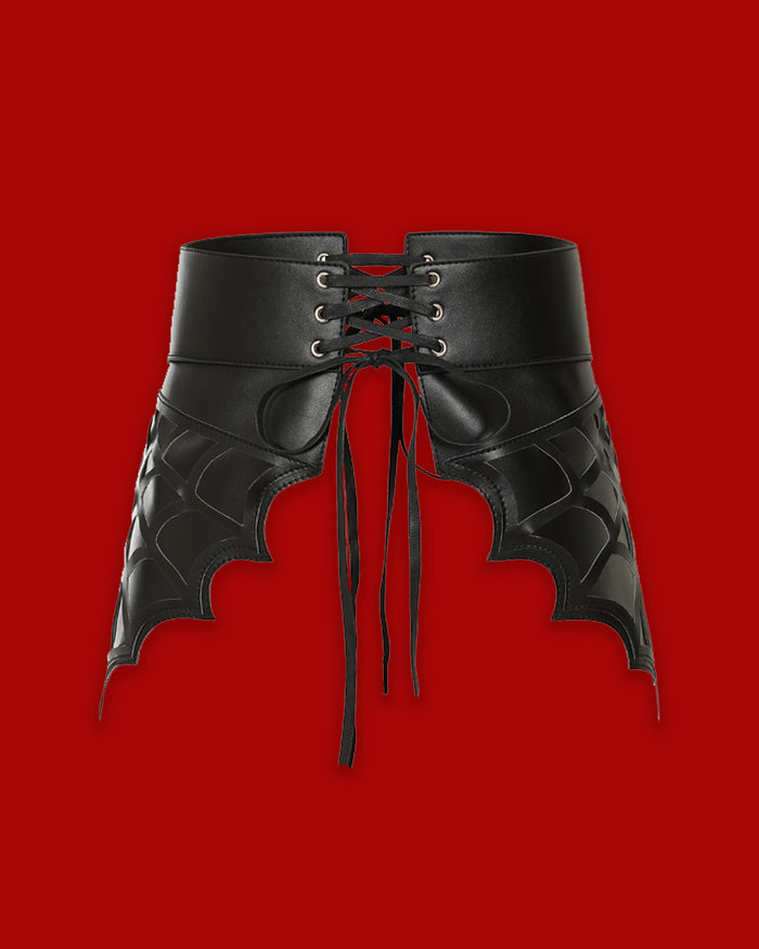 The Twilight Time Corset Belt combines gothic elegance with a contemporary edge in a structured waist-defining design. Intricate cut-out details add visual interest while the corset-inspired shape accentuates the waist and creates a dramatic silhouette. Adjustable for a customizable fit, this statement accessory can be layered over dresses, tops, or outerwear to add bold gothic flair to alternative and everyday outfits.