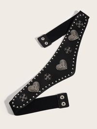 The Wild Heart Belt combines western-inspired metal detailing with a flattering waist-defining silhouette. Its textured synthetic leather front is embellished with silver-toned heart and cross accents, while the unique V-shaped design draws attention toward the center of the waist for a slimming effect. The wide elastic back band provides stretch and comfort, and double snap buttons create a secure closure.