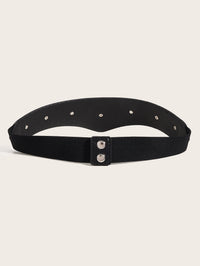 A dramatic western-inspired belt featuring a V-shaped textured synthetic leather front adorned with detailed silver-toned hearts and crosses. Designed to create a flattering, slimming appearance, the Wild Heart Belt draws the eye inward at the waist while adding bold character to an outfit. Its wide elastic stretch back ensures comfort and flexibility, finished with secure double snap closures for easy wear.