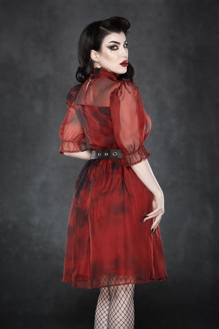 Southern Gothic vamp style chiffon dress in deep blood red, with soft ruffled details at the high neck, airy puffed 3/4 sleeves, and a billowy short skirt that moves gracefully in the breeze. Designed for both comfort and allure, the tie-dye sheer overlay reveals a red slip beneath, while an elastic waist adds stretch and ease. Ideal for summer events, gothic-inspired outfits, or vintage boho fashion lovers seeking a dramatic yet wearable statement piece.