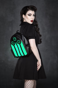 Vegan leather LED chapel backpack with a colorful stained glass motif that lights up in red, green, and purple for a bold gothic look. Designed for functionality and fashion, this unique accessory offers adjustable straps, a handy pocket, and sturdy craftsmanship in a compact 23cm x 30cm x 11cm frame. Ideal for those who love dark alternative fashion, music festivals, or statement streetwear, it’s both spooky and groovy.