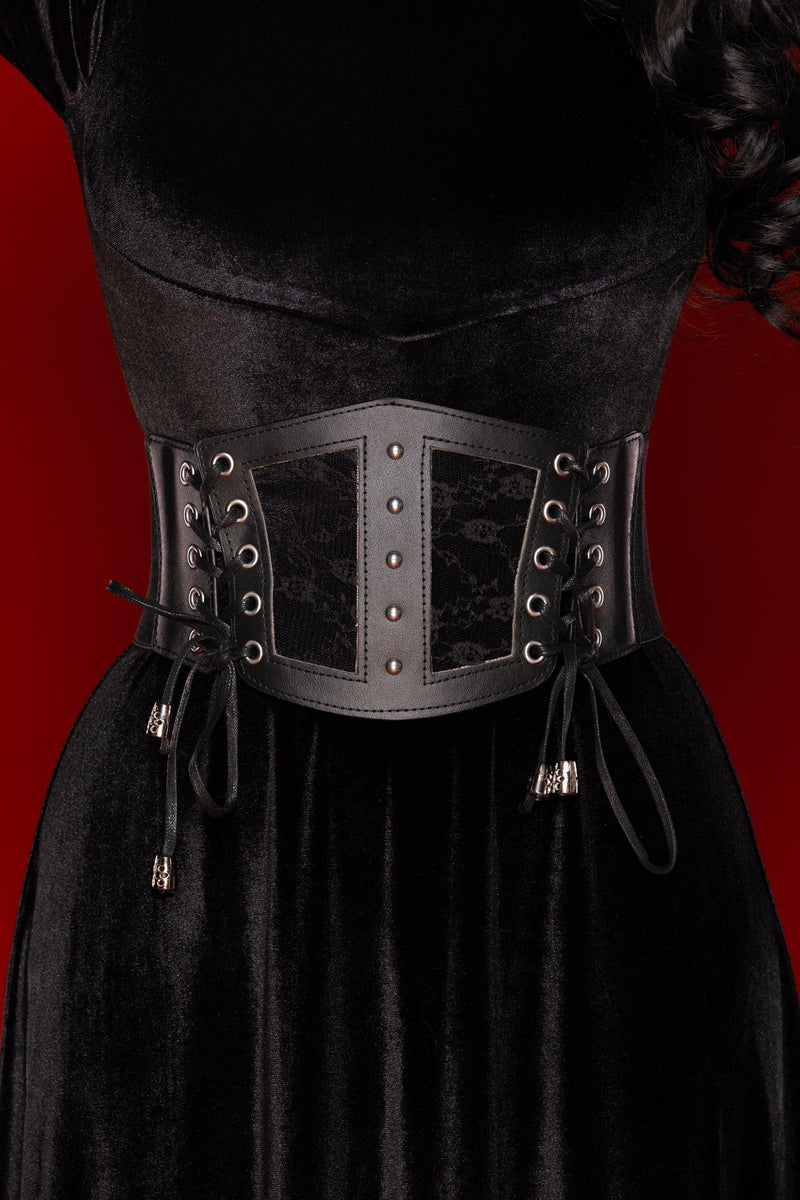 Black lace corset belt with vegan leather panels and stretch back, designed to cinch the waist and elevate dresses, blazers, or oversized shirts with a bold, feminine silhouette.