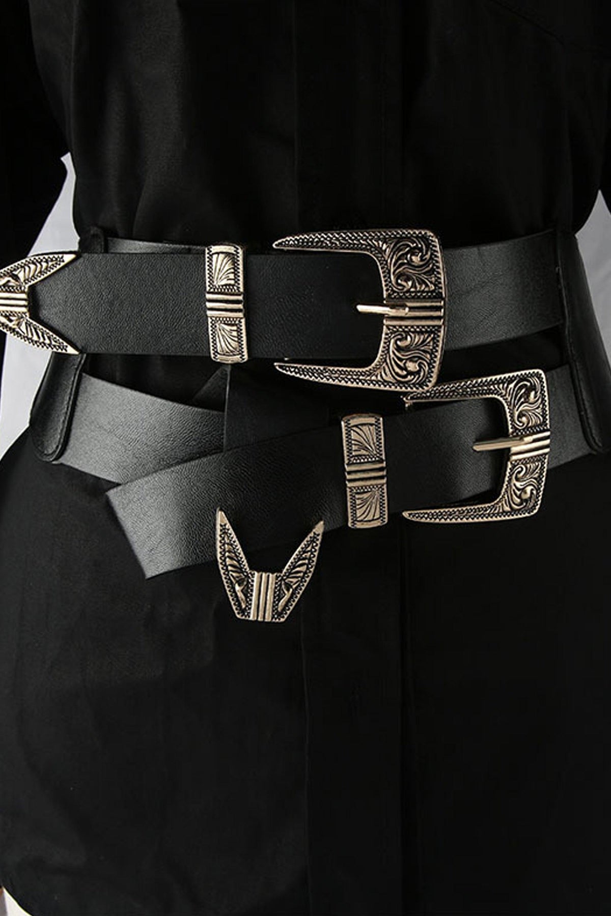 Turn up the edge with the Double Buckle Belt from KATAKOMB—a sleek black stretch design with dual antique‑silver western‑inspired buckles. One size fits most, making it the perfect statement accessory to cinch dresses, high waists or trousers for bold, alternative style.