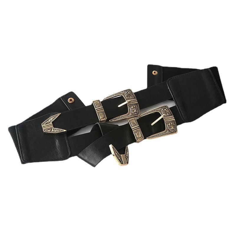 The KATAKOMB Double Buckle Belt introduces dual buckle detail and a flexible elasticised fit—one size does it all. Wear it over a blazer, tunic or dress to accentuate your waist and bring a strong, stylish finish to your outfit.