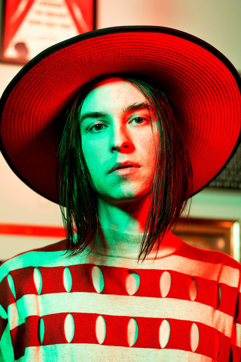 KATAKOMB premium wool Dracula Flat Top Hat in black with a bright red underside brim, designed to add sophistication and edgy flair to any outfit.